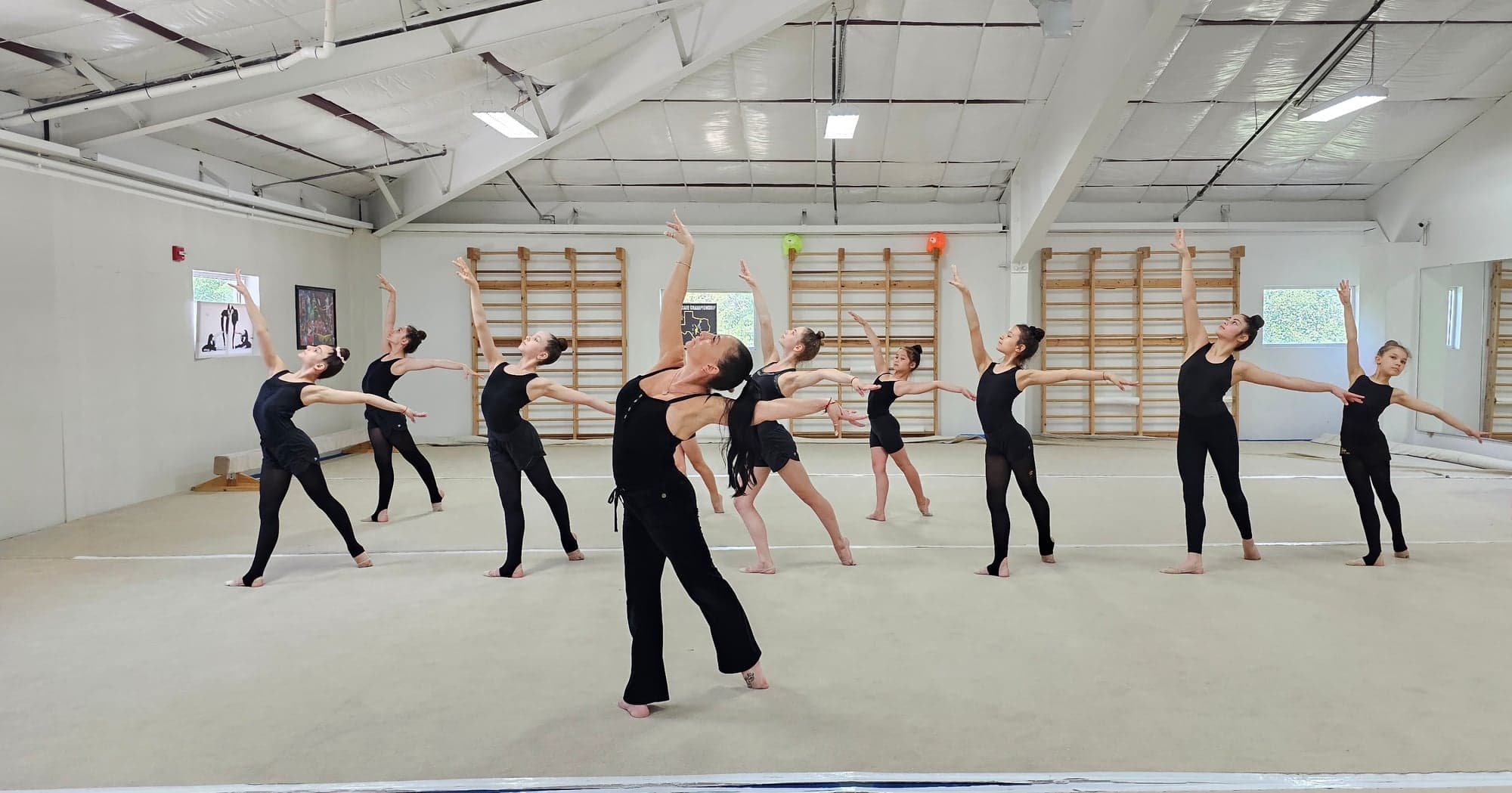 Coach Ella leading dance class