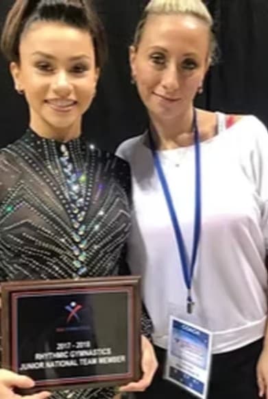Coach Ella with Junior National Team award