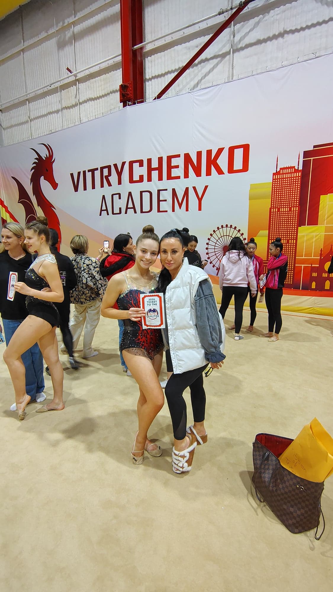Athlete posing with coach at Vitrychenko Academy